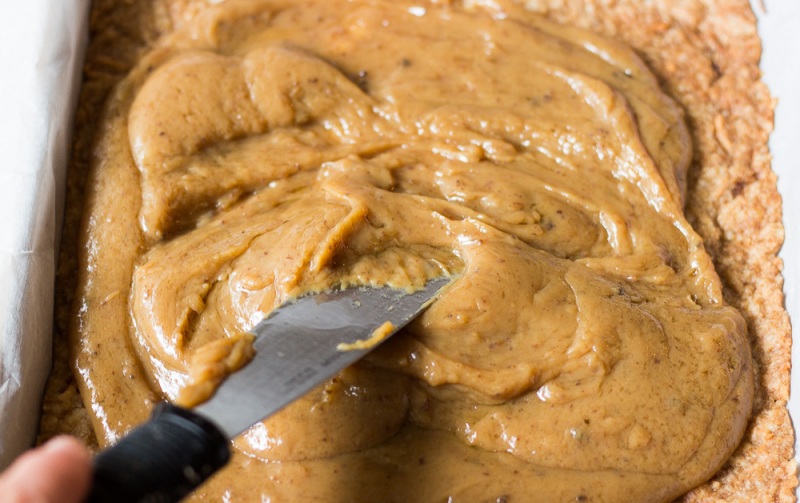 Spread caramel over base